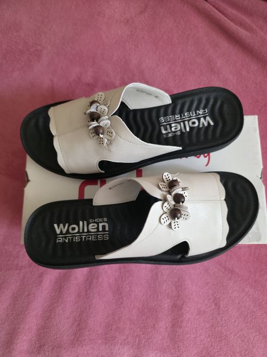 Жіночі шкіряні шльопанці на танкеткі