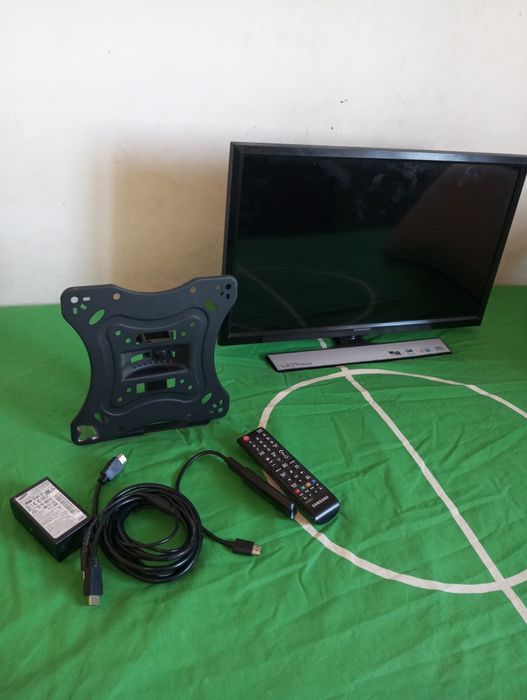 Televisão com controle original