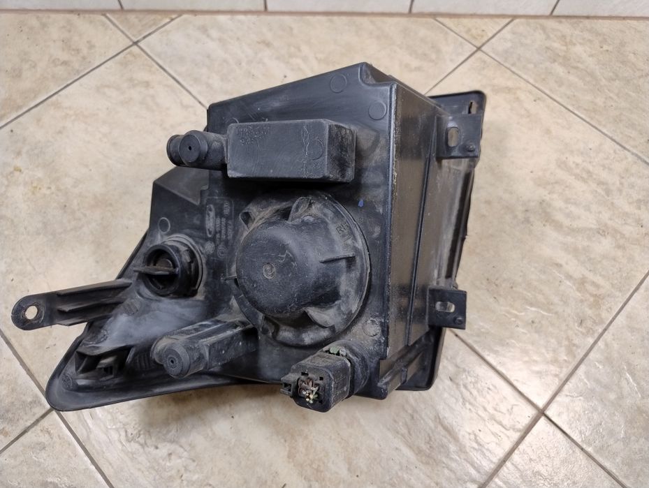Ford connect tourneo lampa reflektor lewy przód Europa oryginał wysyłka Ford Transit Connect I (2002-2013)