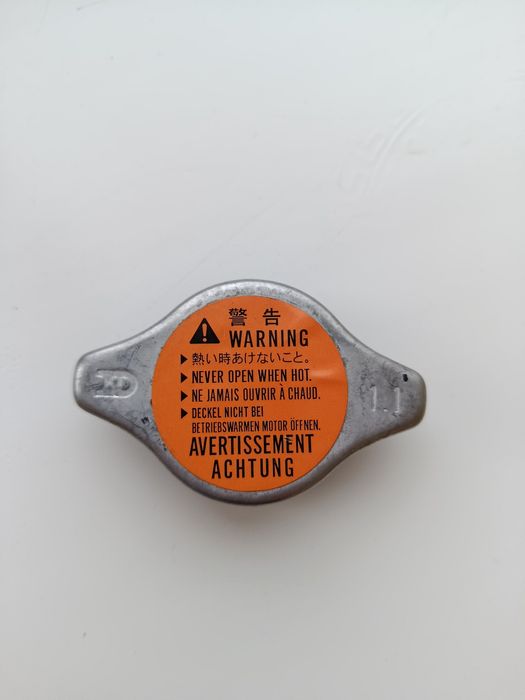 Кришка радіатора Mitsubishi