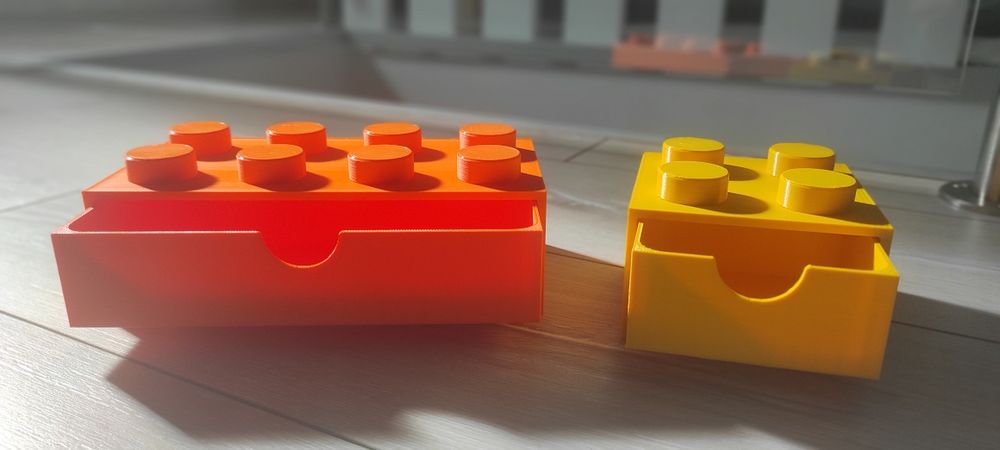 Caixa de arrumação formato Lego