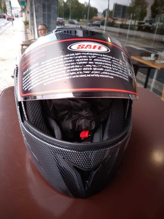 Capacete Modular Novo com oculos e saco.