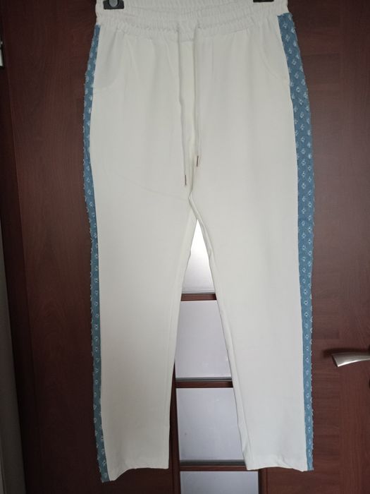Białe spodnie Punto Milano
