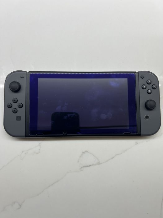 Nintendo Switch V2 + EXTRAS