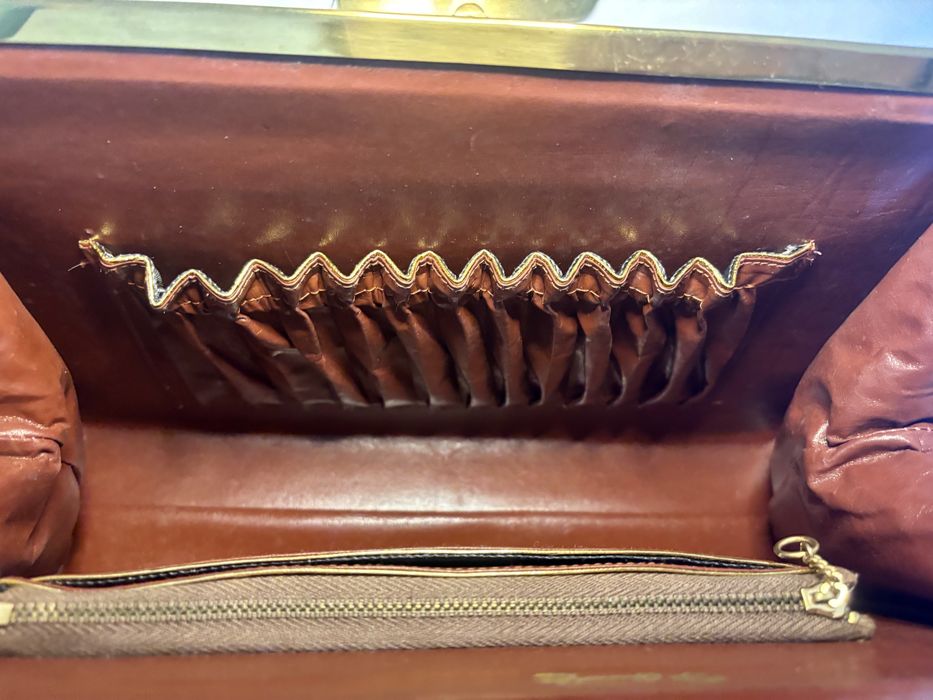 Mala em pele de crocodilo verdadeira