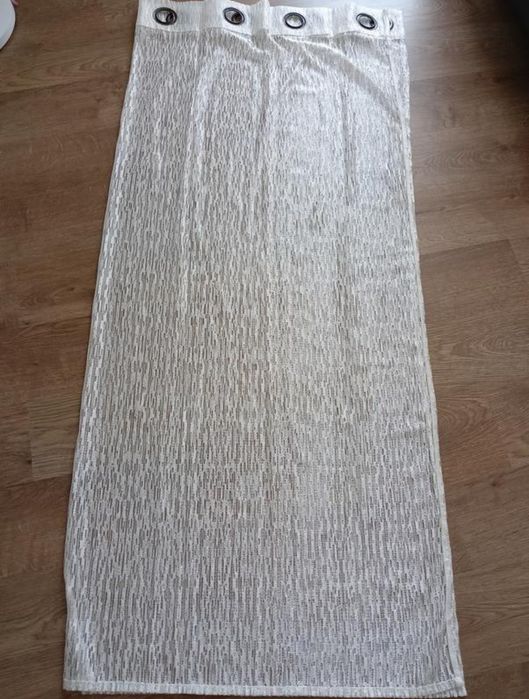 Тюль на кільцях.