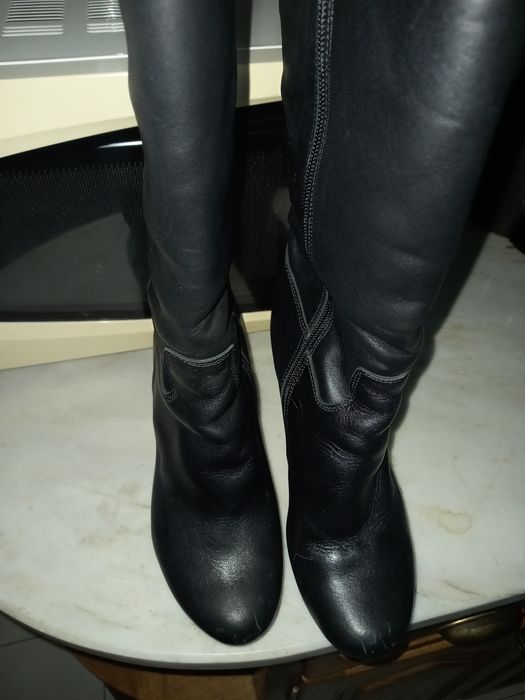 Botas em pele como novaz