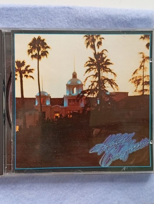 CD диск  Eagles Hotel California Asylum Records а также Led Zeppelin ,Rolling stones, Eric Clapton и др.