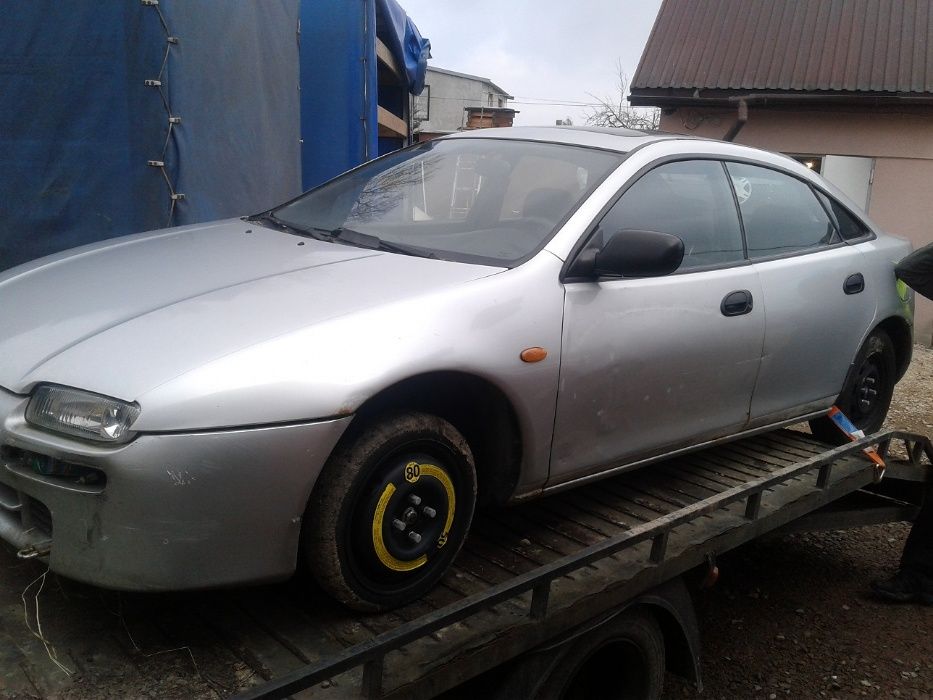 MAZDA 323 Drzwi Przód Tył Srebrne Szyba Klamka Zamek