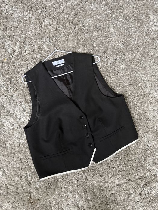 Стильна жіноча жилетка великого розміру