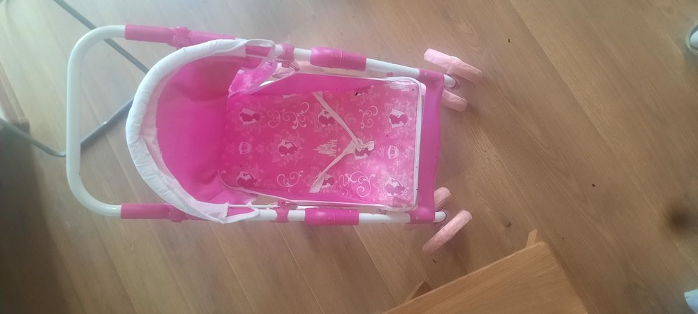 Игрушечная коляска