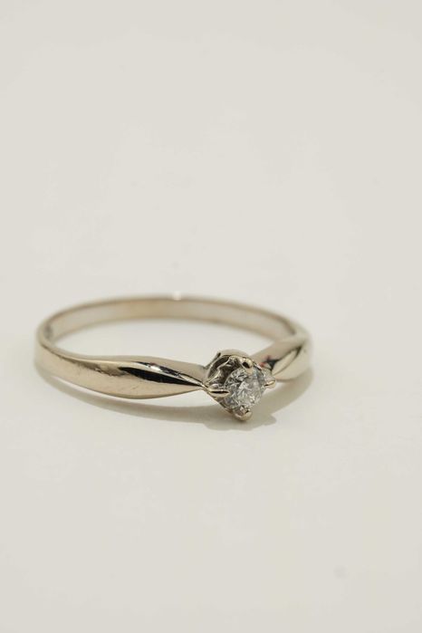 Złoty pierścionek z brylantem 1.48g 14K