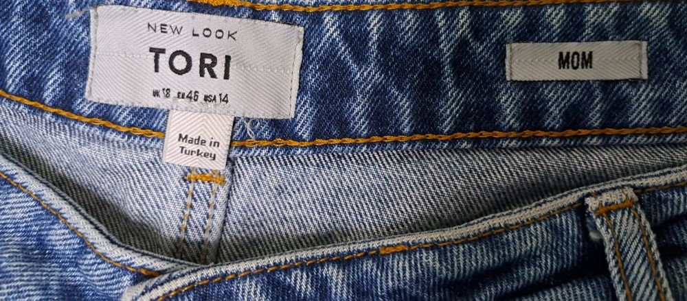 Джинсы мом великого розміру