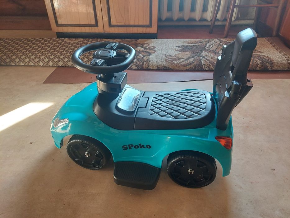 Продам машину из ручкою дитяча