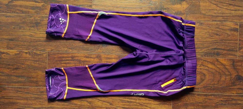 Craft damskie legginsy 3/4 r.S fioletowo-pomaranczowe