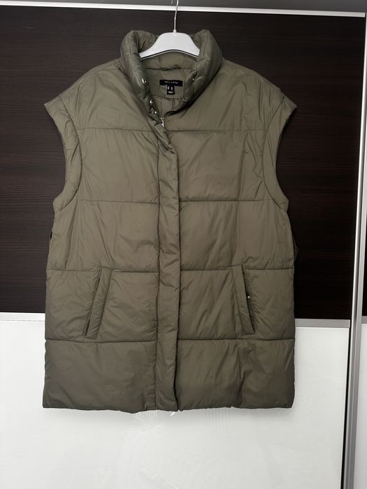 Жилетка кольору хакі 42 розмір