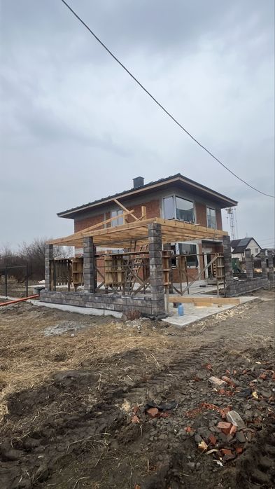 Будівництво Будинків