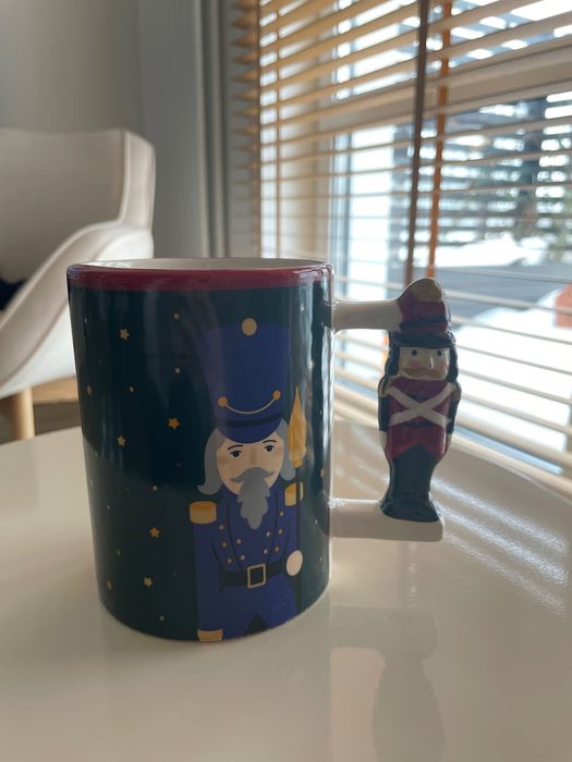 Kubek z dzieckiem do orzechów