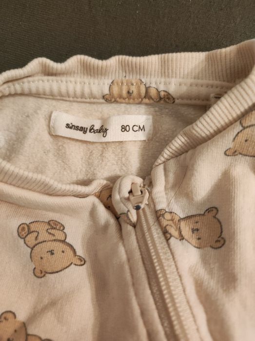 Trzy kombinezony/pidzamki