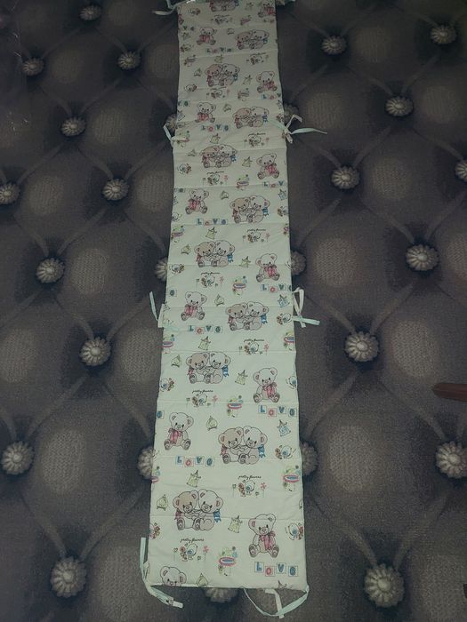 Бортик в дитяче ліжечко