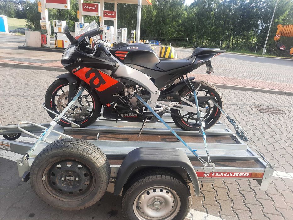 pomoc drogowa transport  laweta koparka widlak ciągnik bus przyczepa