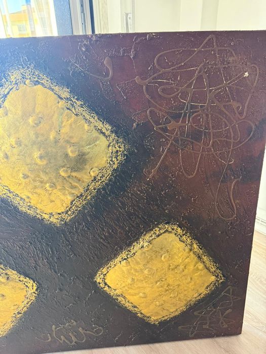 Quadro castanho e dourado