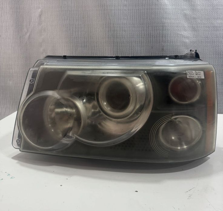 Farol xenon esquerdo  Rang Rover L320 Sport