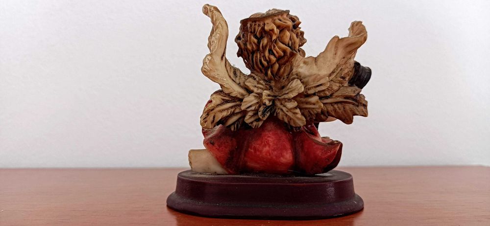 Figura de Anjo a tocar viola em porcelana