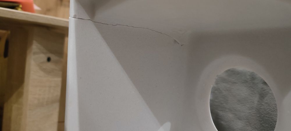 Умивальник над пральною машиною