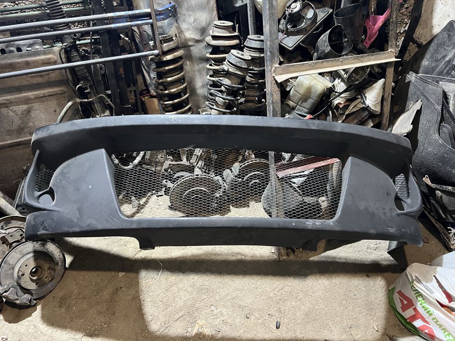 Бампер тюнингованый  новый