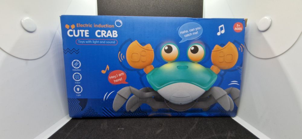 Caranguejo para "tummy time" com bateria