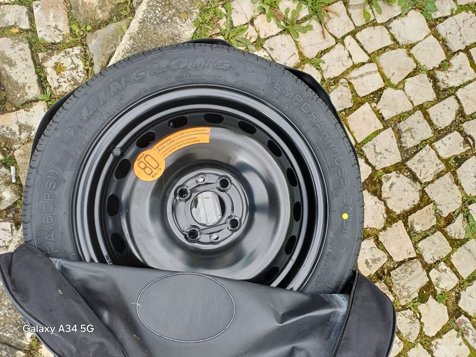 Kit Pneu suplente com macaco e chave de roda  nunca usado