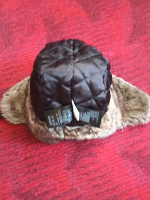 Новая  теплая шапка фирмы Н and M  57размер