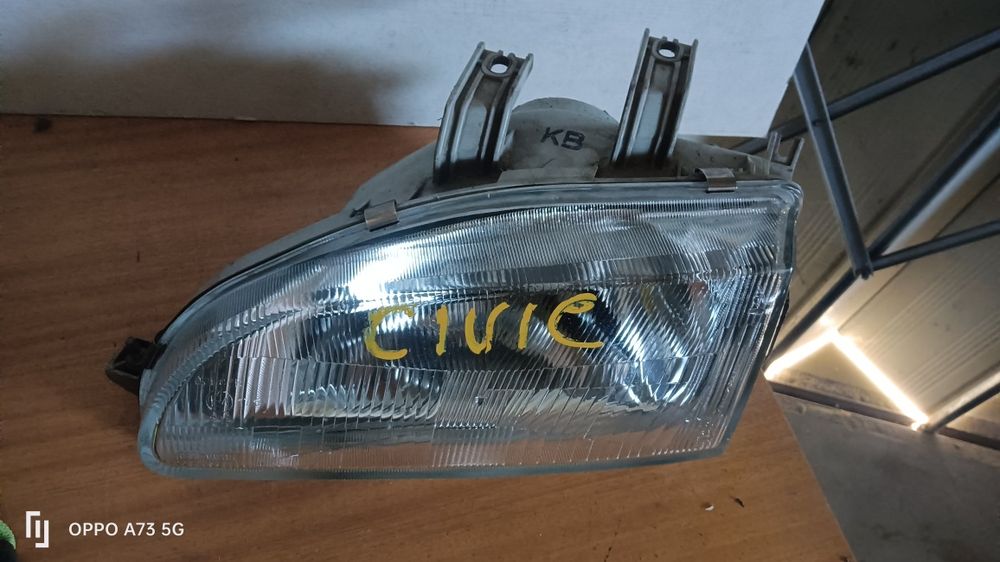 Farol Honda Civic eg5 ótica esquerda