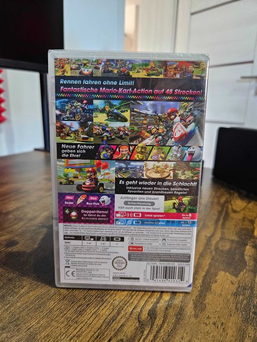 Nintendo Switch OLED Neon + nowy Mario Kart 8 Deluxe - stan niemal idealny - darmowa dostawa