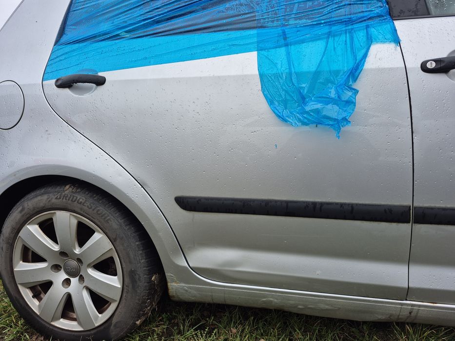 Poszycie drzwi prawy tył golf v plus La7w