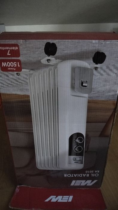 Aquecedor a Óleo MEI RA 2010 em  Branco.