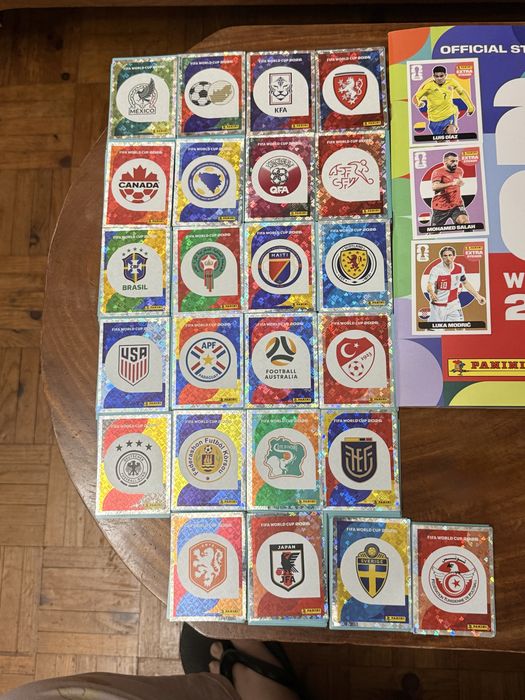 Conjunto completo da Panini FIFA World Cup 2026 (Caderneta + 980 cromos + 7 Extra Stickers)