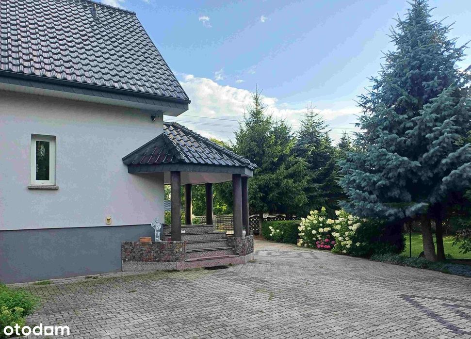 Ładny dom na pięknej działce z własnym dużym stawem
