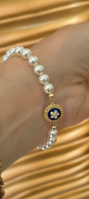 Pulseira pérolas com caramujo em prata