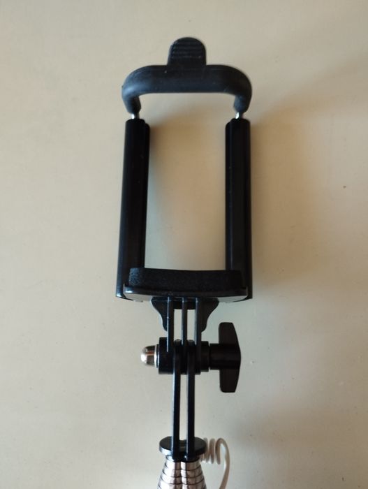 Adaptador para telemóvel telescópio