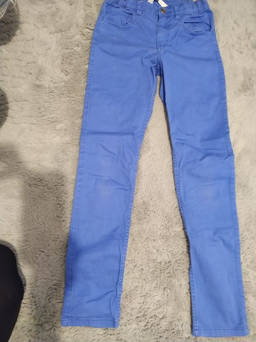Niebieskie spodnie dziewczęce H&M, rozm. 152 cm