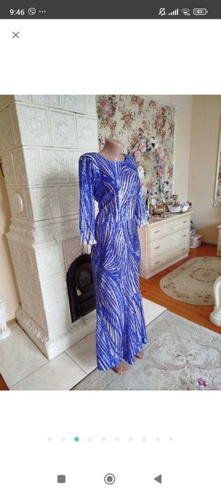 Шикарна вечірня сукня розшита паєтками