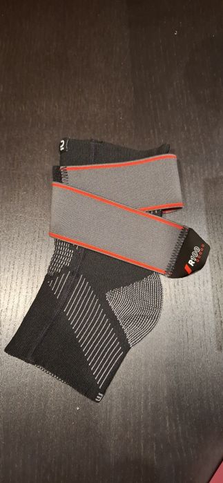 Tornozeleira de Suporte Ligamentar Esquerda/Direita Adulto R100 Preto