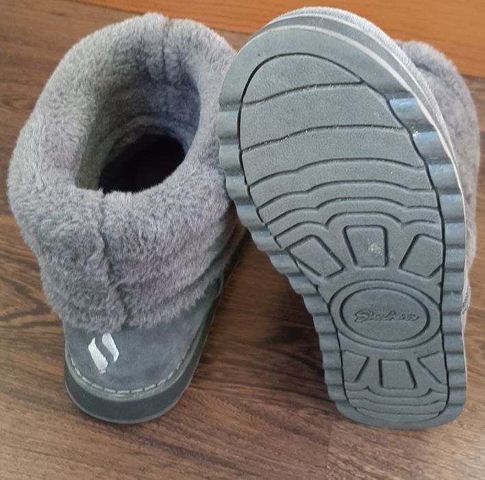 Botas de senhora da Skechers.