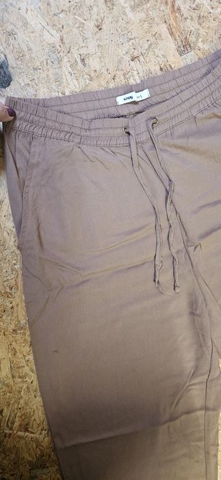 Spodnie joggery Sinsay rozm. 40