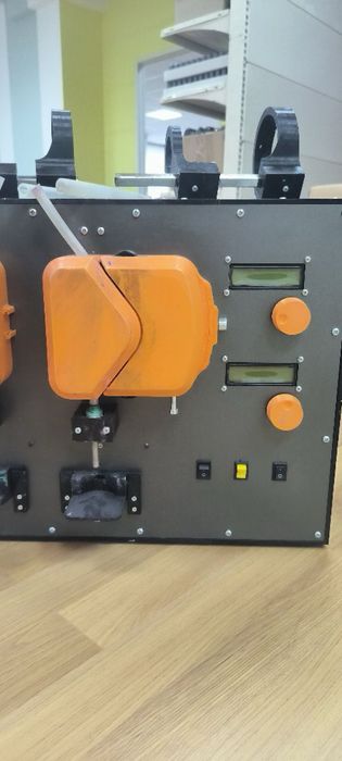 Універсальний дозувальний  апарат для рідин і вязких