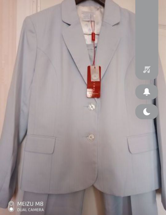 Жіночі брючні костюми Castro.