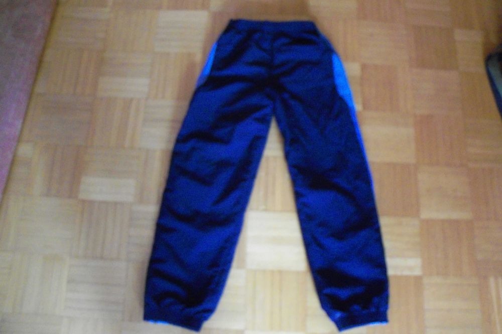 ADIDAS granatowe spodnie dresowe na podszewce chłopięce rozm.146-152