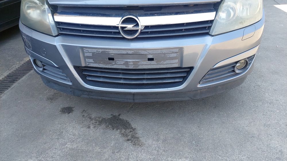 Pára-choques frente OPEL Astra H Caravan (L35)